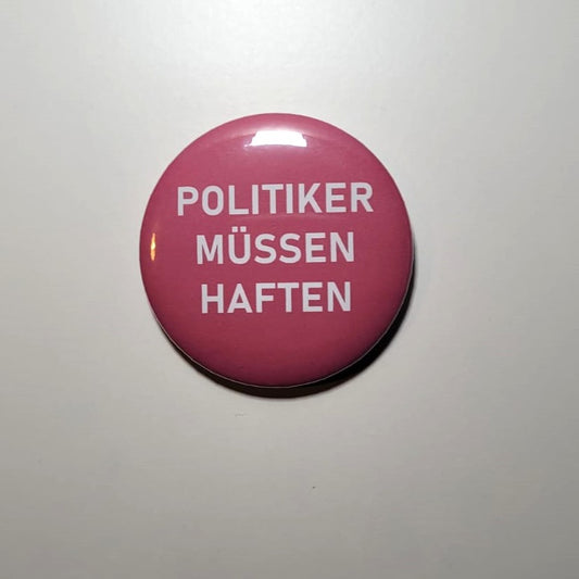 Button "POLITIKER MÜSSEN HAFTEN"